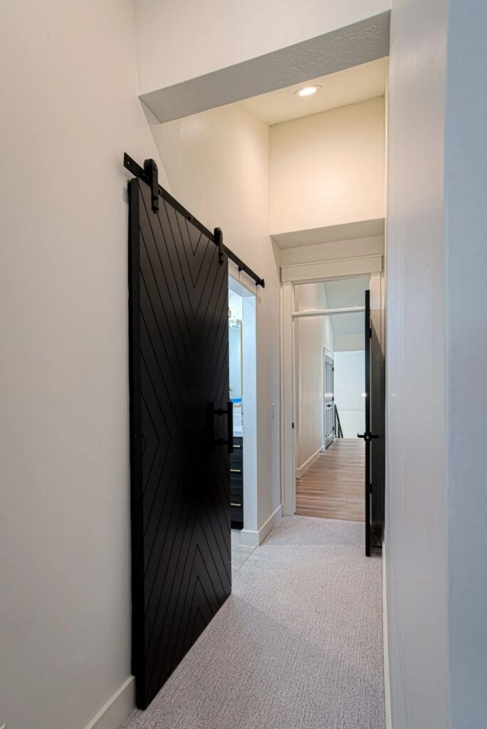 Northshore hallway with barn doors